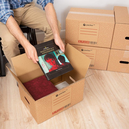 Boîte en carton ultra-résistante pour déménagement et stockage avec poignées, fabriquée en carton rigide, idéale pour le déménagement ou le stockage de livres et de vêtements, transport confortable et sûr grâce aux poignées latérales - Packer PRO