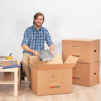 Boîte en carton ultra-résistante pour déménagement et stockage avec poignées, fabriquée en carton rigide, idéale pour le déménagement ou le stockage de livres et de vêtements, transport confortable et sûr grâce aux poignées latérales - Packer PRO