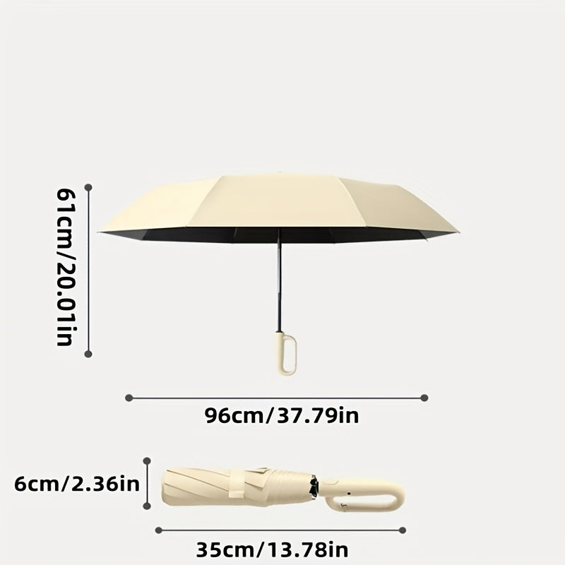 Parapluie pliant automatique à anneau rotatif élégant, conçu avec renfort en fibre de verre pour une résistance au vent, doté d'un tissu haut de gamme et d'une poignée pour une utilisation facile à une main. Son style minimaliste en fait un cadeau idéal p