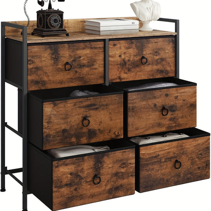 1 commode avec un meuble à tiroirs comprenant six tiroirs en tissu, conçue pour le rangement dans la chambre à coucher, le salon ou le couloir, avec une structure en métal dans un style industriel vintage, finie en marron et noir