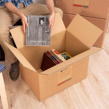 Boîte en carton ultra-résistante pour déménagement et stockage avec poignées, fabriquée en carton rigide, idéale pour le déménagement ou le stockage de livres et de vêtements, transport confortable et sûr grâce aux poignées latérales - Packer PRO