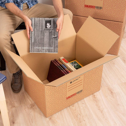 Boîte en carton ultra-résistante pour déménagement et stockage avec poignées, fabriquée en carton rigide, idéale pour le déménagement ou le stockage de livres et de vêtements, transport confortable et sûr grâce aux poignées latérales - Packer PRO